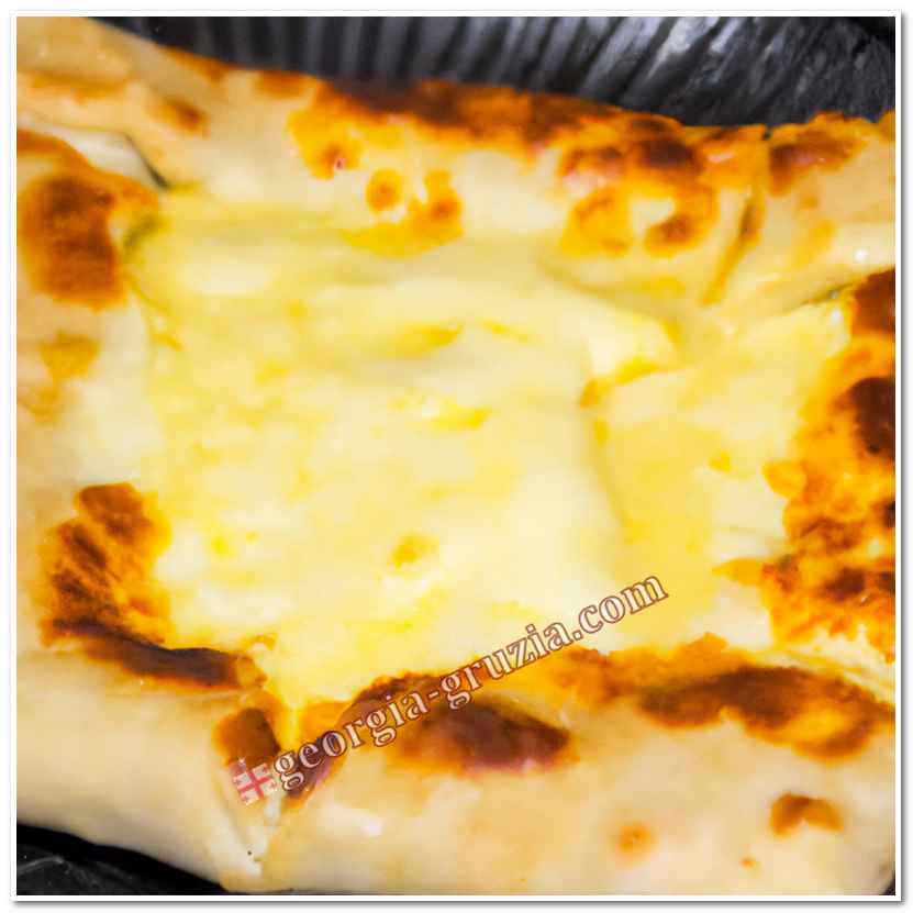 Khachapuri with cheese on a pan fast recipe