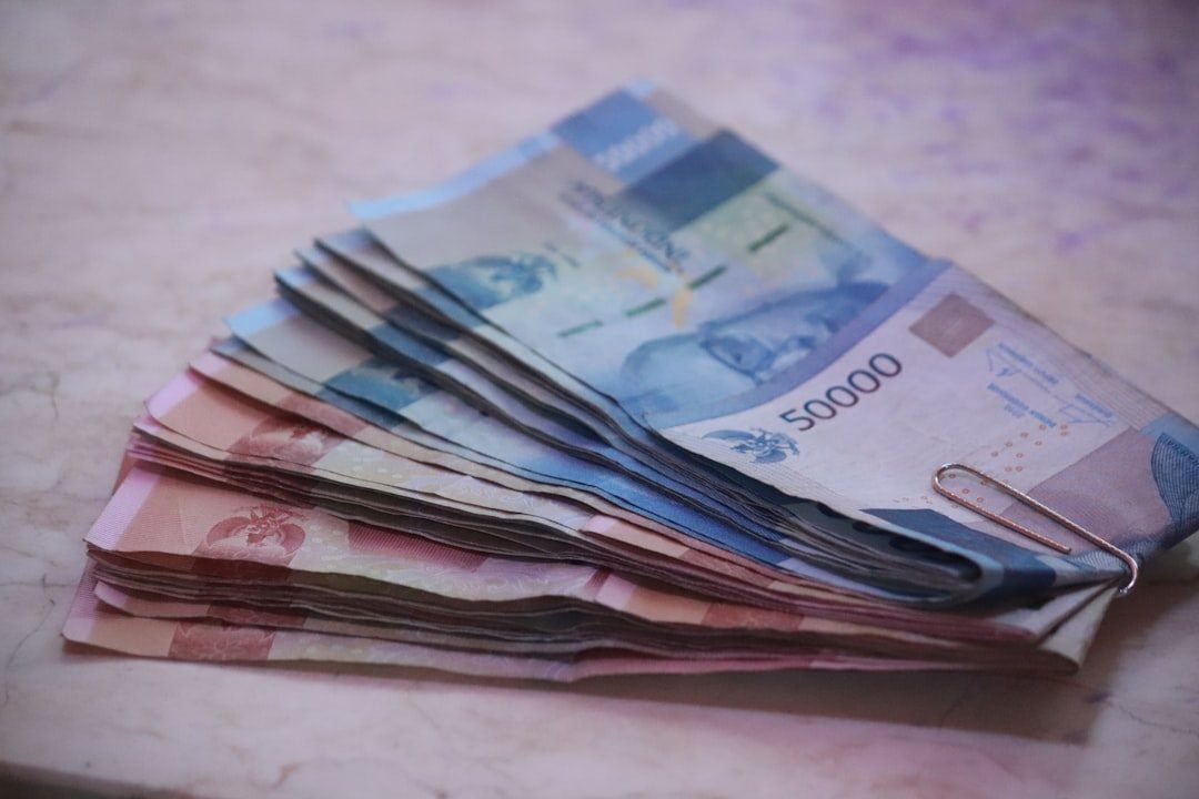 money which is the medium of exchange in Indonesia 200 banknote on white textile