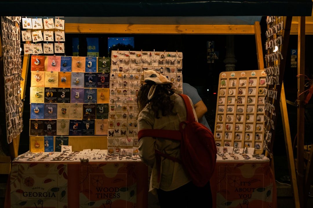 Tbilisi market street a person looking at a book display